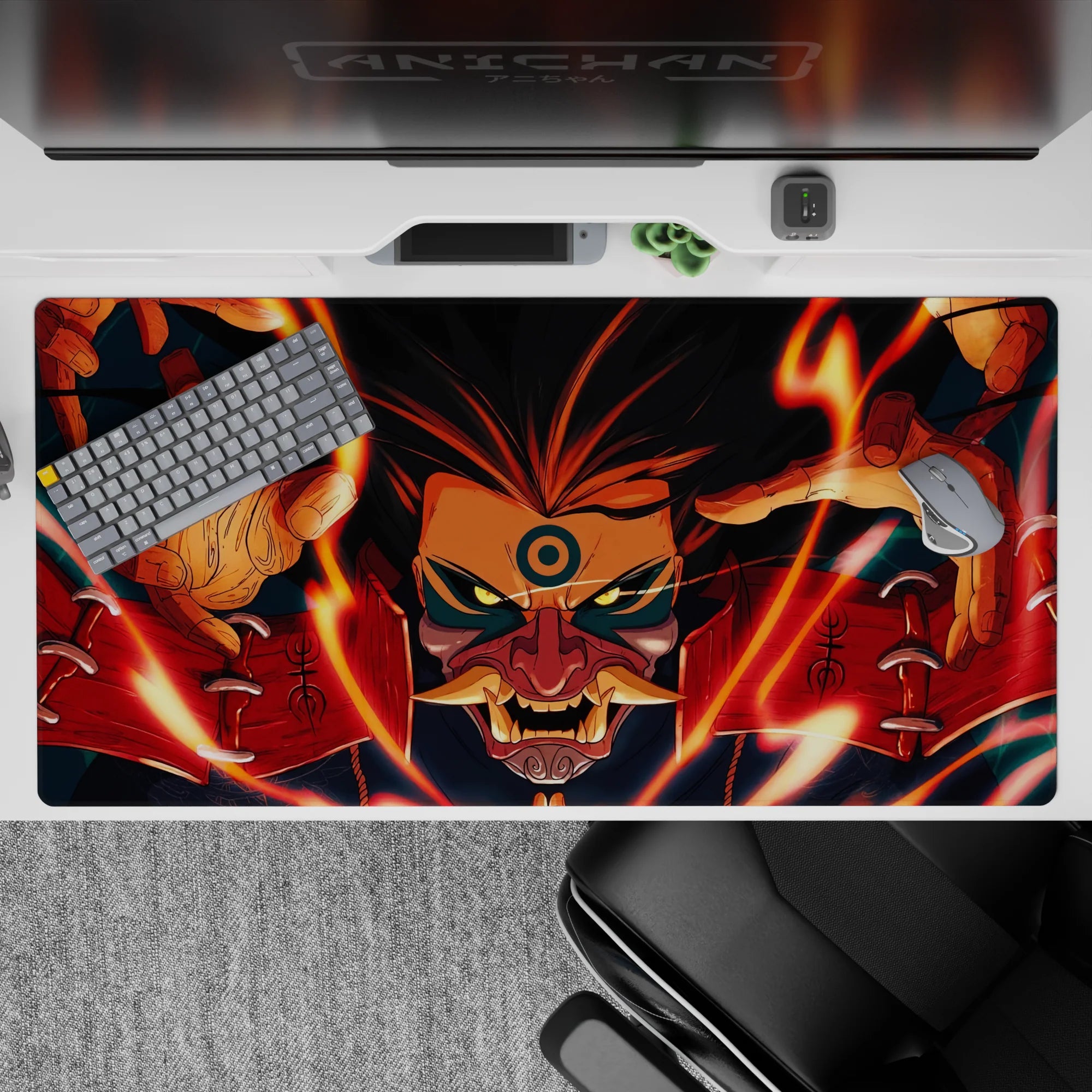 40x20 inches Naruto desk pad in fiery orange, deep red, and midnight blue with intense yellow-eyed menace.