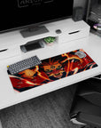 32x12 inches Naruto mouse pad with Kurama staring over the desk, mask-like markings and reaching claws.