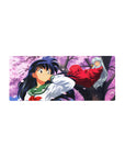28x12 inches anime mouse pad with Kagome in green uniform and Inuyasha on a sakura branch, petals.