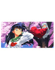 32x16 inches anime mouse pad with Kagome in green uniform and Inuyasha on sakura branch, petals.