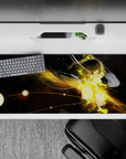 Deep space-black 36x16 inches anime desk pad with warm amber sparks, gold streaks, dreamy night vibe.