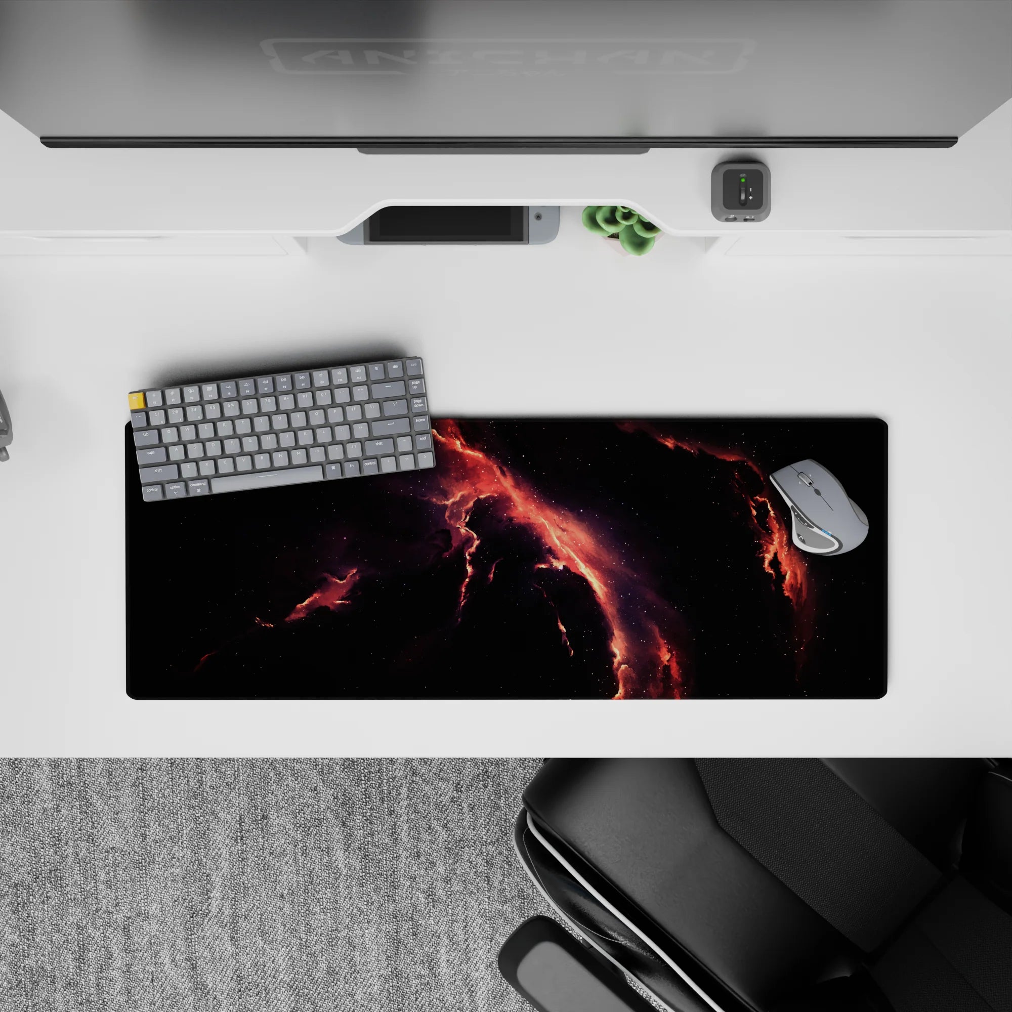 Moody black mouse pad 32x12 inches with molten coral, ember-red seams, and soft violet haze.
