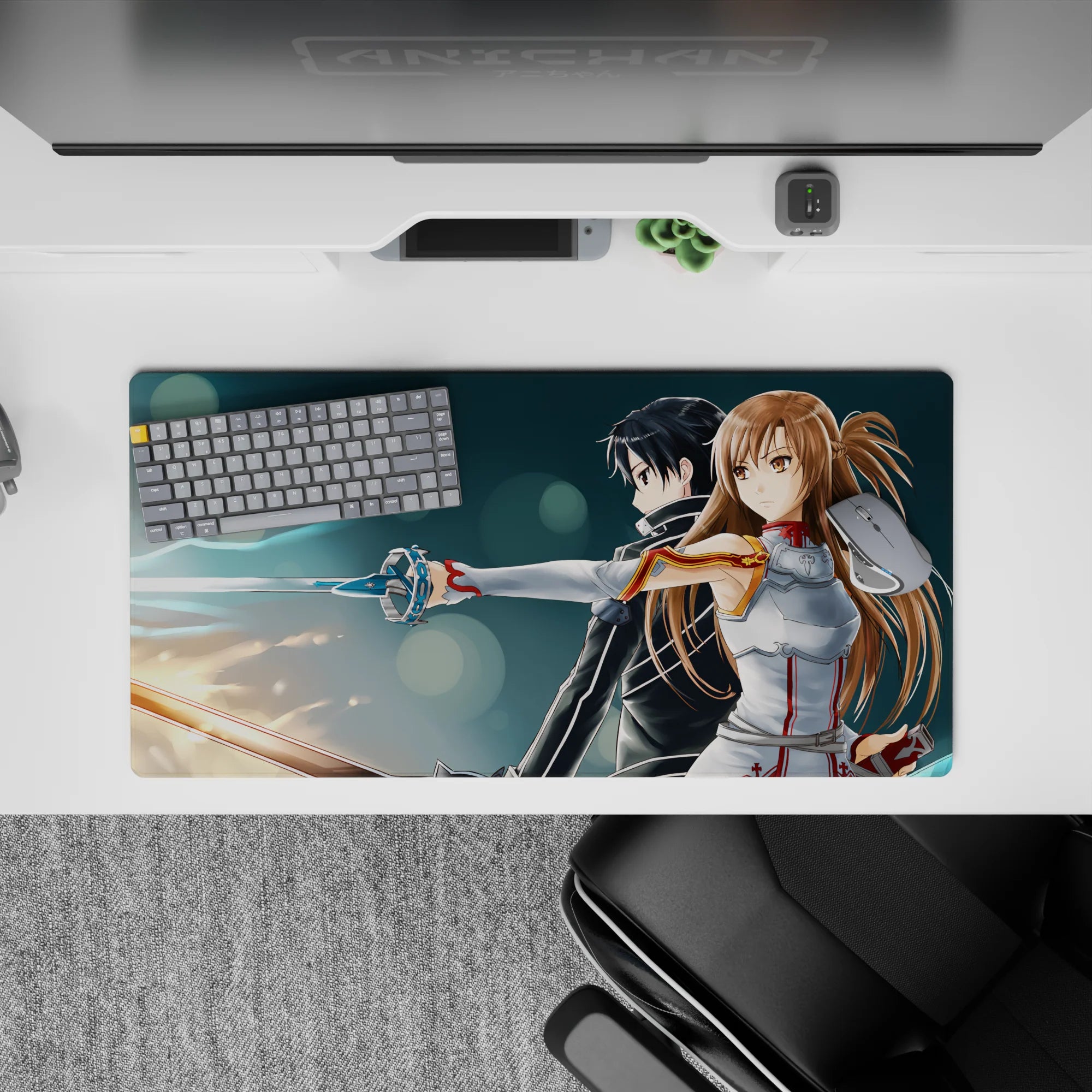 Anime mouse pad 32x16 inches featuring Sword Art Online's Kirito and Asuna, swords glowing blue and amber, battle-ready.