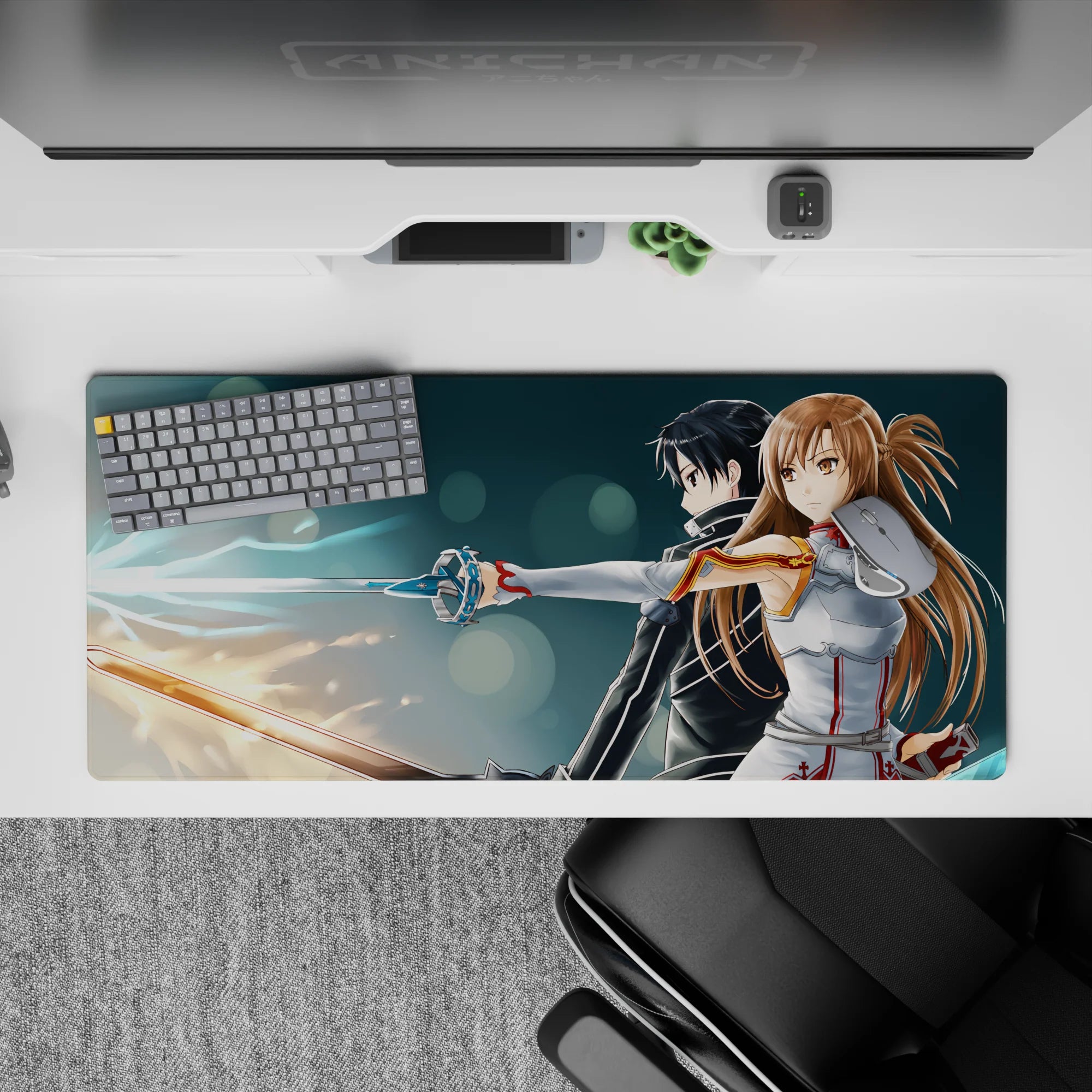 Anime mouse pad 36x16 inches featuring Kirito and Asuna from Sword Art Online, showcasing their glowing swords and powerful poses.