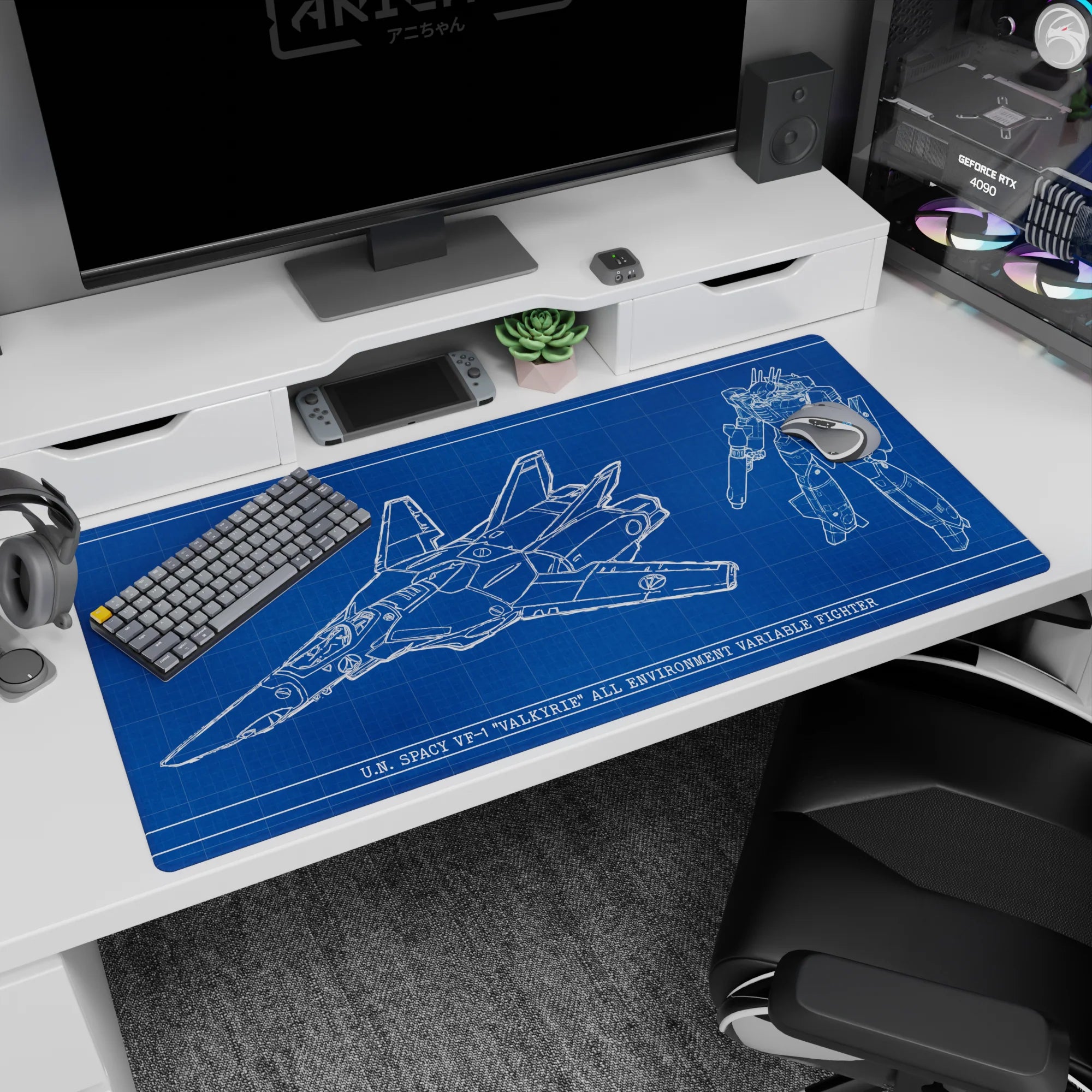 40x20 inches Macross desk pad showing U.N. Spacy VF-1 Valkyrie in fighter left, Battroid right.