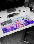 36x16 inches desk pad featuring shy pink twin-tail anime girl waving hello in a cozy cat-ear hoodie.