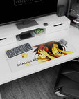 Yoh Asakura leaning in with red headphones, eyes closed, on an anime mouse pad 32x12 inches with spirits.