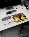 Yoh Asakura with red headphones, eyes closed, on anime mouse pad 32x16 inches with glowing spirits.