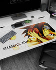 Yoh Asakura leaning in with eyes closed, red headphones tight, on a 40x20 inches anime desk pad.
