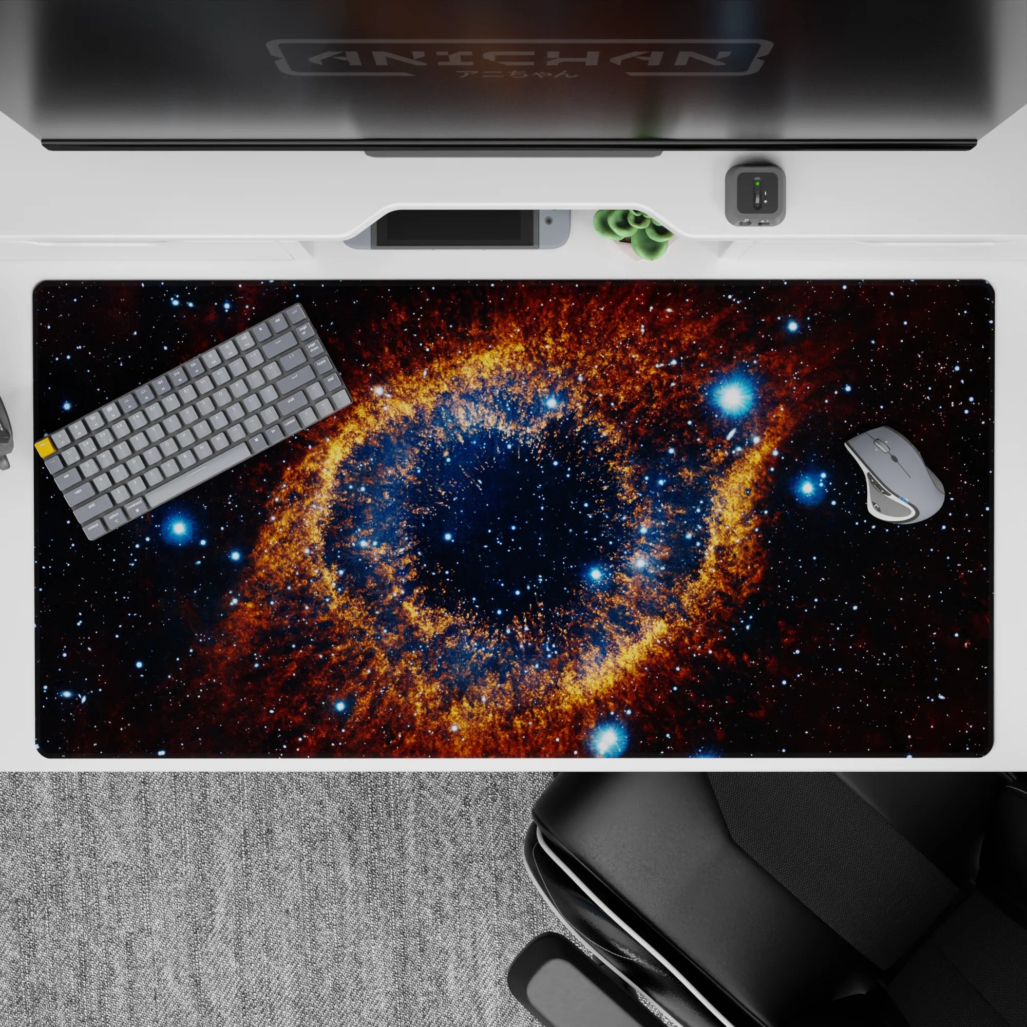 Midnight blue and warm amber starfield desk pad with inky galaxy mood, 40x20 inches.