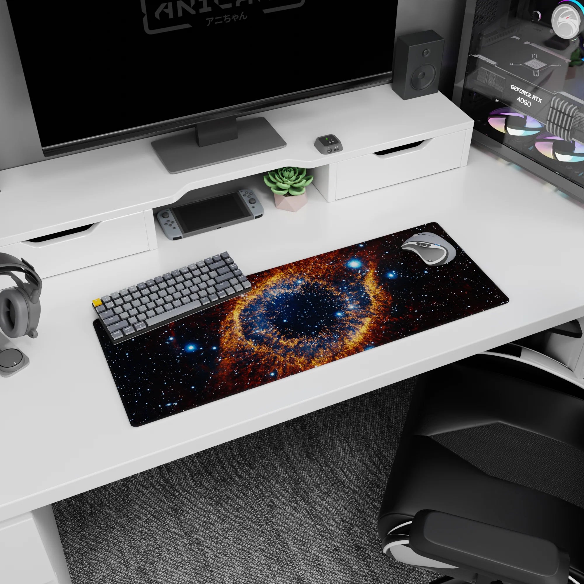 Cosmic eye nebula mouse pad 32x12 inches with swirling galaxy and bright pinpoint stars.