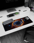 Cosmic eye nebula mouse pad 32x12 inches with swirling galaxy and bright pinpoint stars.