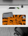 28x12 inches anime mouse pad in fierce orange and inky black, wild grin energy for late-night gaming.