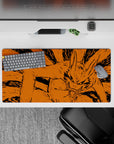 32x16 inches anime mouse pad in fiery orange with bold black ink strokes, intense Naruto vibes.