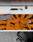 Fiery orange and ink-black anime desk pad 36x16 inches with chaotic fur lines and intense vibe.