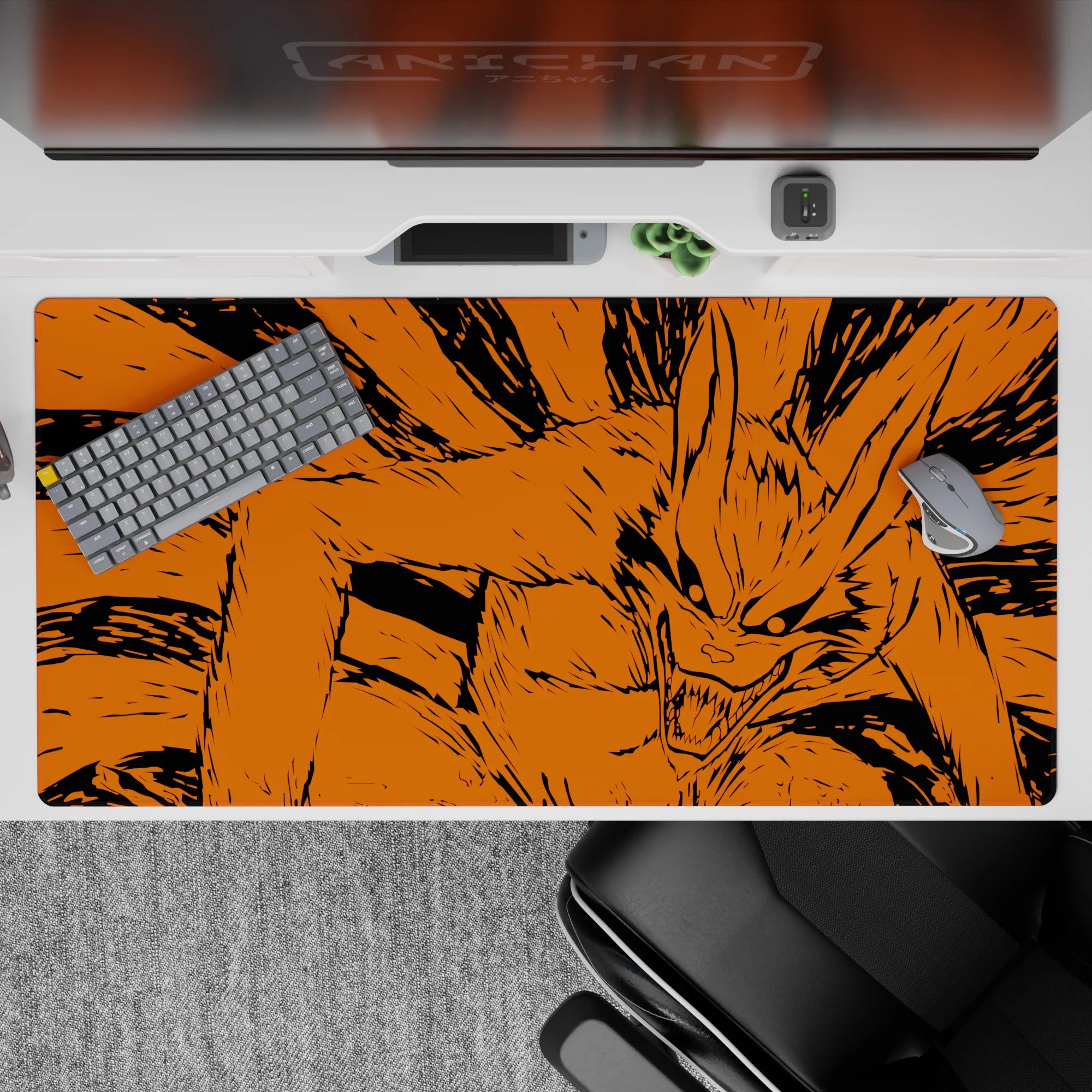40x20 inches extended desk pad in fierce orange and inky black, wild chaotic energy for gaming.