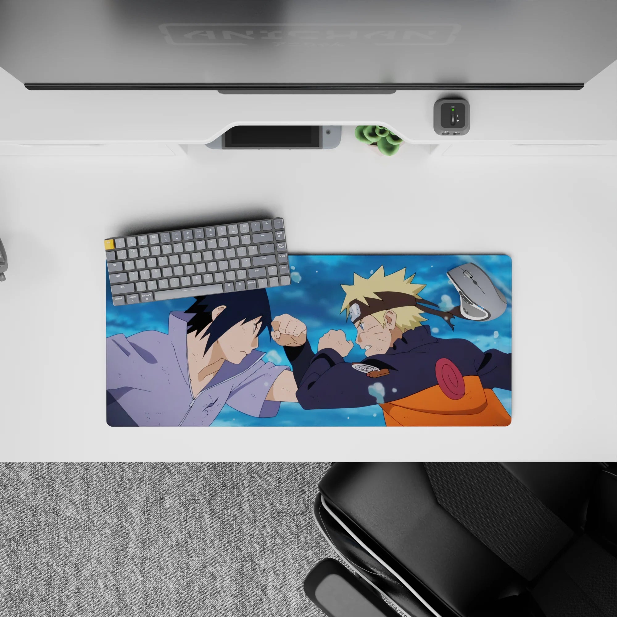 28x12 inches anime mouse pad in blue splash tones with bold orange, black, and lavender accents.