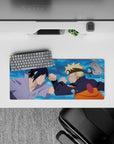 28x12 inches anime mouse pad in blue splash tones with bold orange, black, and lavender accents.