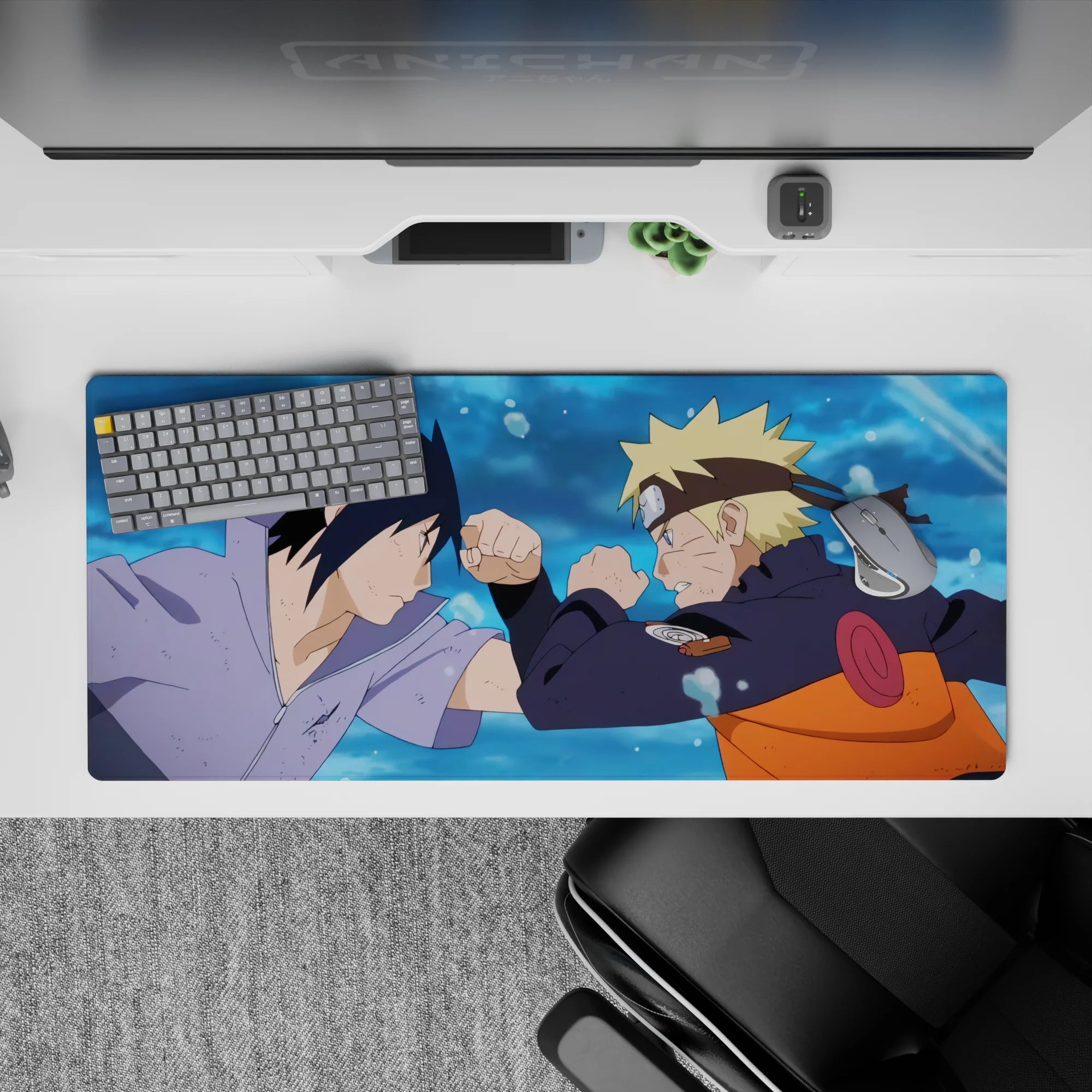 36x16 inches anime desk pad in blue water-splash tones with orange, black, and cool lavender accents.