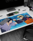 Naruto Uzumaki vs Sasuke Uchiha clash desk pad 40x20 inches, dramatic face-off scene on smooth surface.