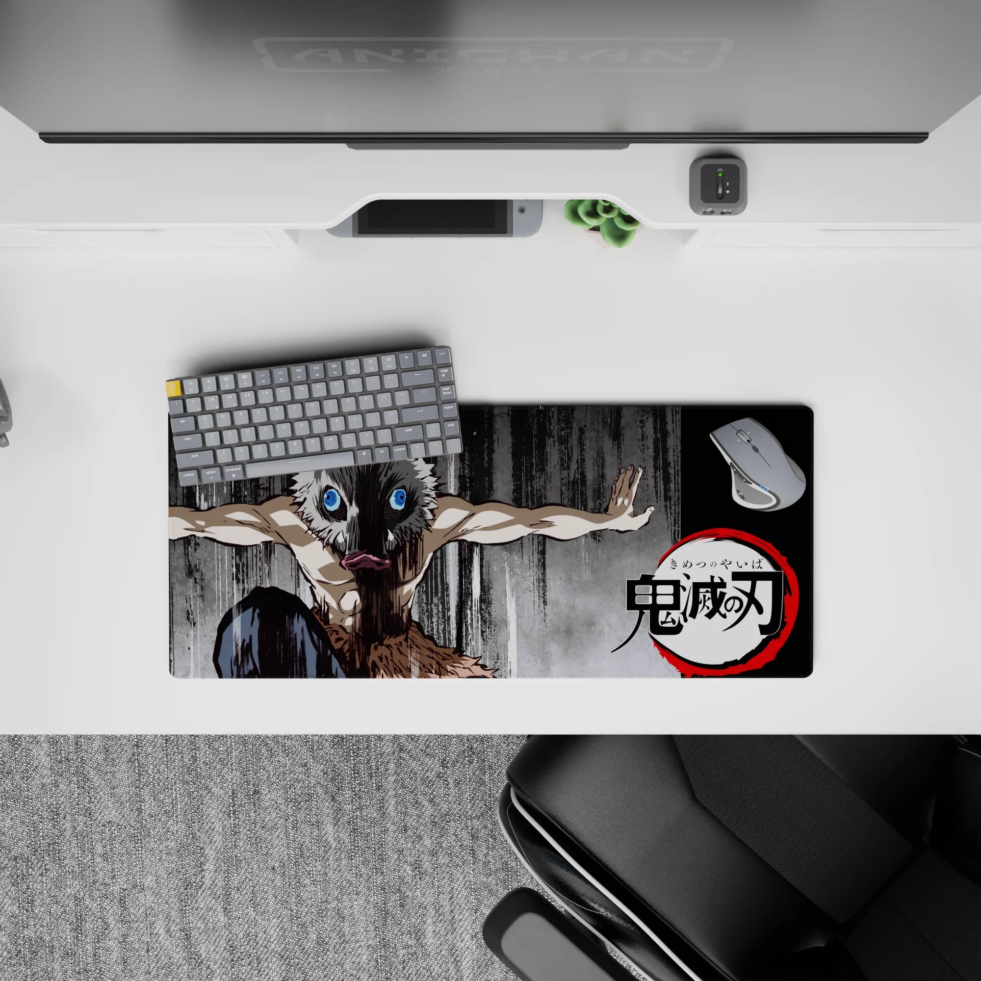 Anime mouse pad 28x12 inches featuring Inosuke from Demon Slayer in boar mask on charcoal background, adding energy to setup.