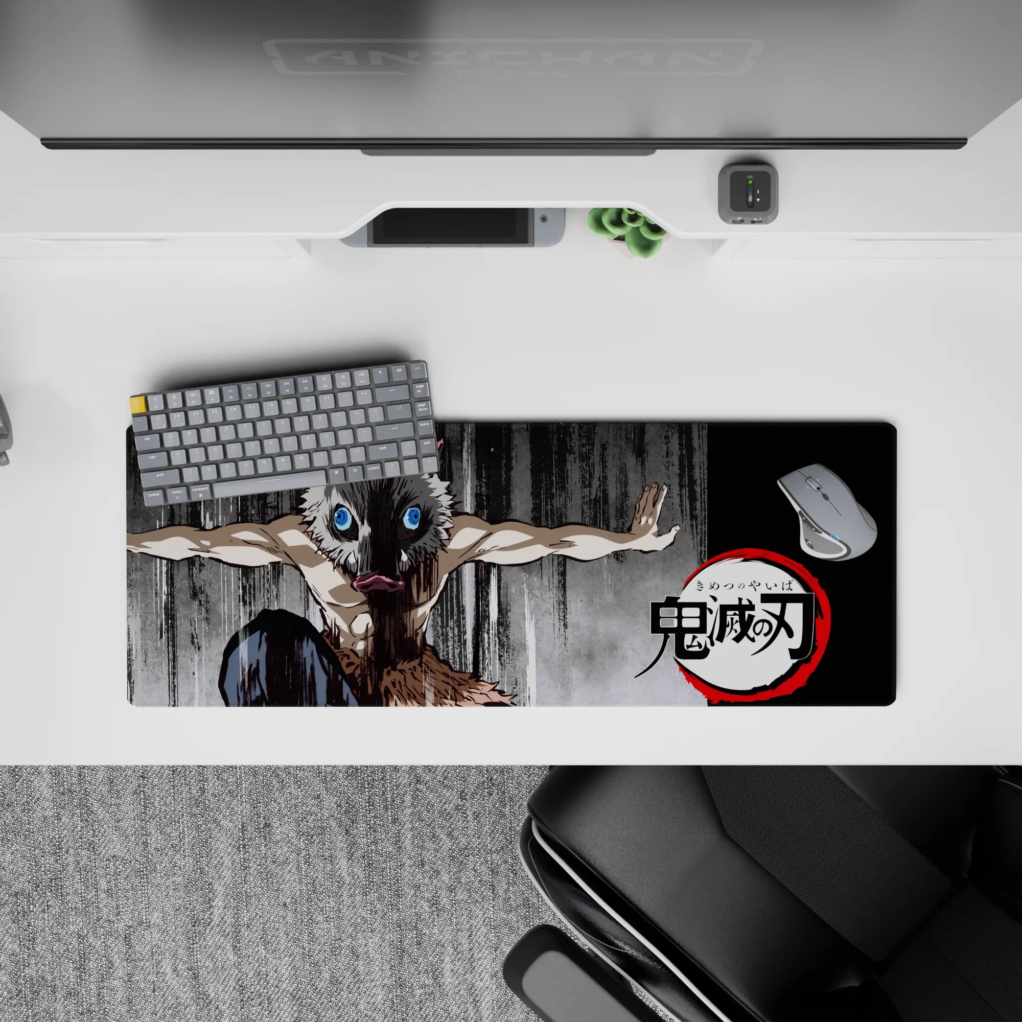 Anime mouse pad 32x12 inches featuring Inosuke from Demon Slayer with boar mask and primal stance on charcoal background.