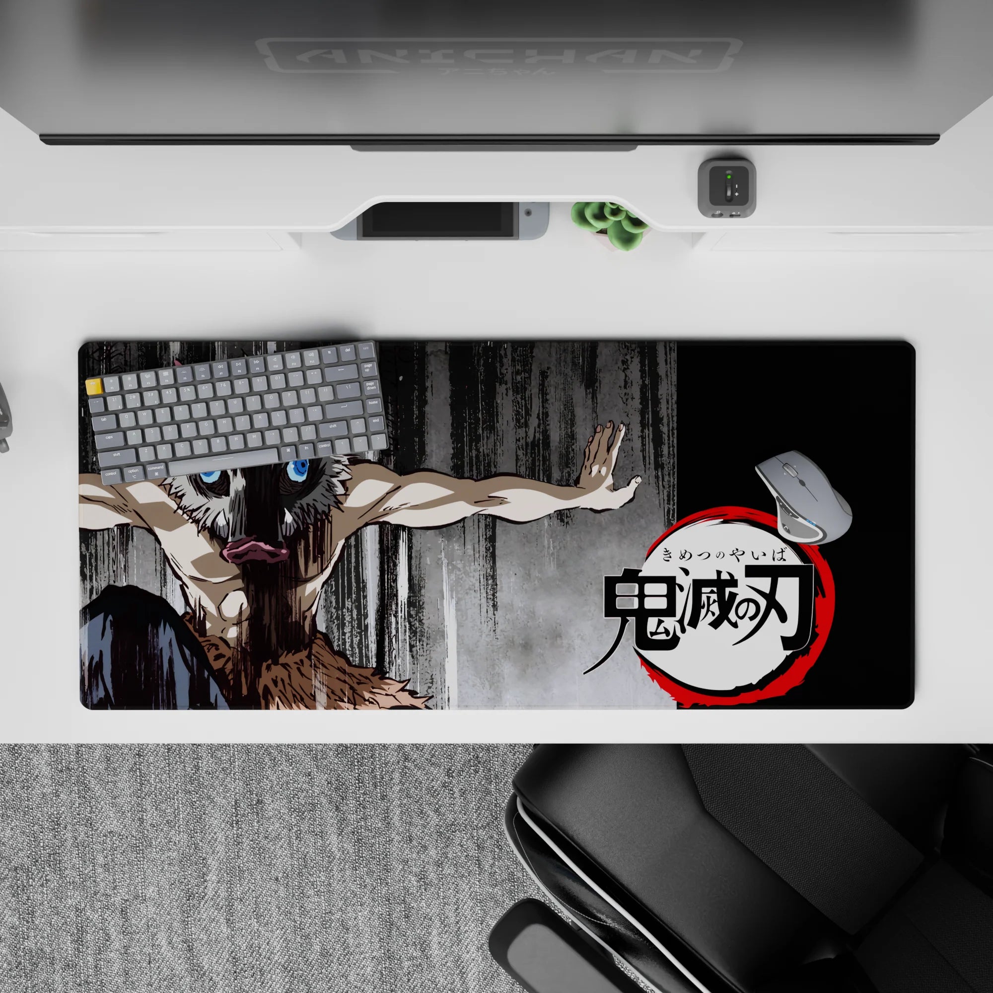Inosuke from Demon Slayer on 36x16 inch desk pad, featuring boar mask, primal stance, and gritty charcoal background.
