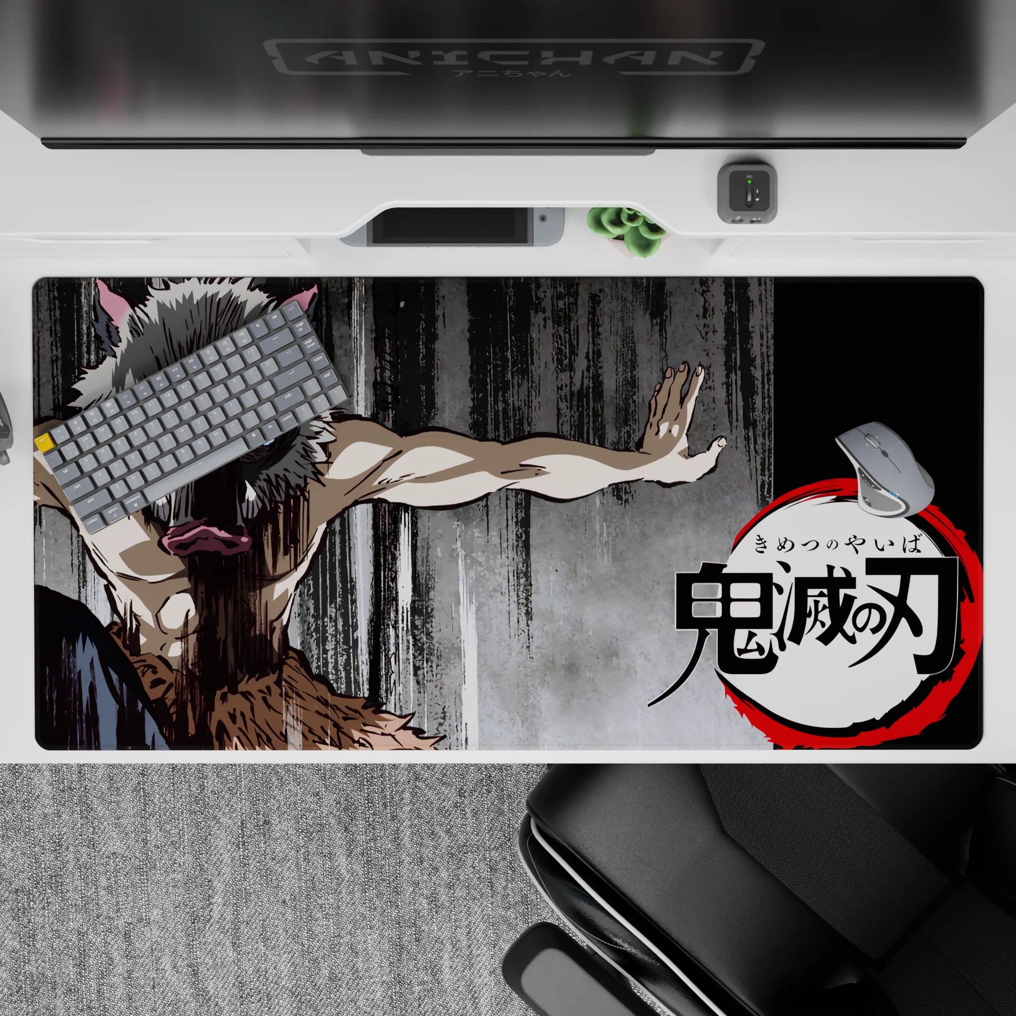 Anime desk pad 40x20 inches featuring Inosuke from Demon Slayer in a primal stance with iconic boar mask on charcoal background.