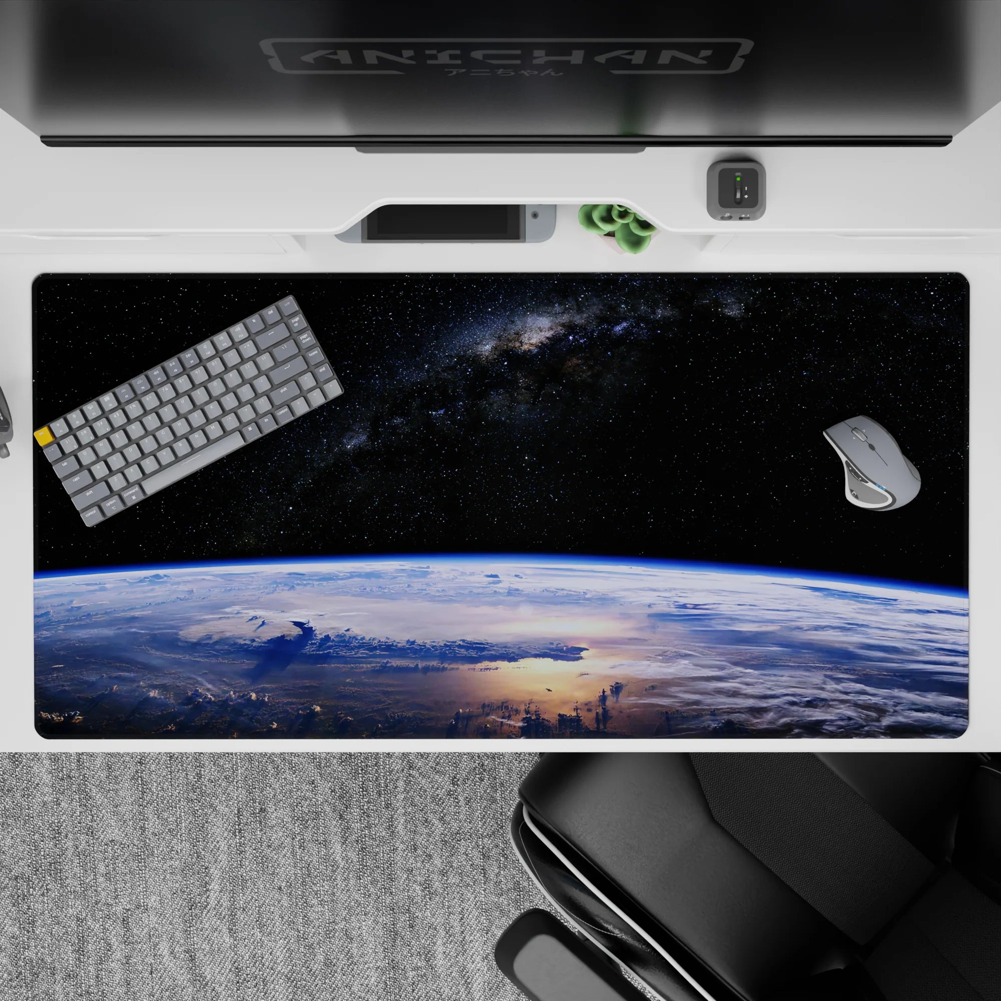 Deep black space desk pad 40x20 inches in calming midnight tones with soft blue glow and stars.