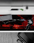 Noir anime desk pad 36x16 inches in deep blacks and blood-red haze with smoky gradients and wind.