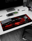 Samurai silhouette by water on an anime desk pad 36x16 inches, katana ready under a red sky.