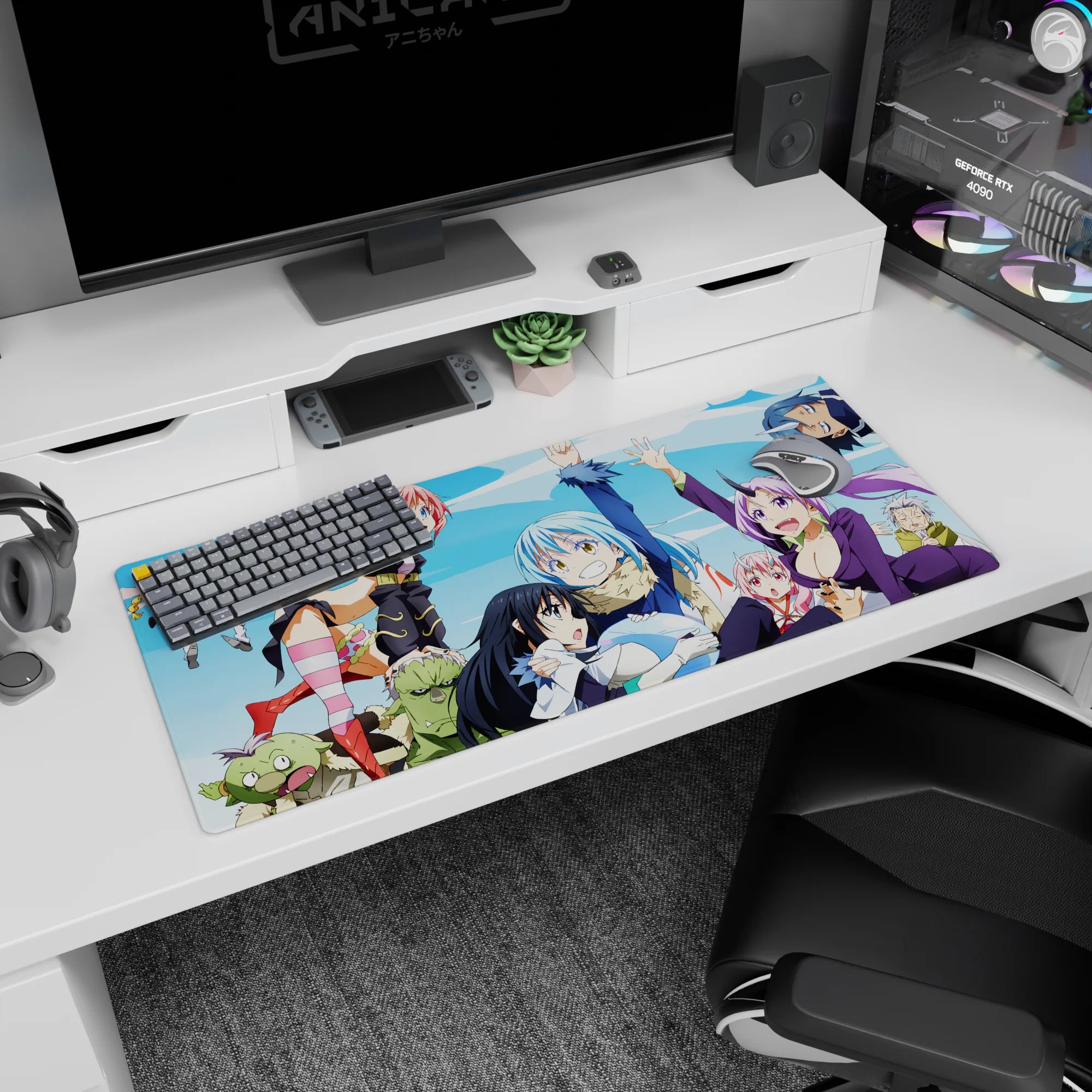 36x16 inches anime desk pad showing Rimuru Tempest grinning with hand raised as Shion and Shuna crowd in.