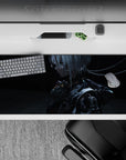 Moody teal-lit sci-fi anime desk pad 36x16 inches, deep charcoal shadows with metallic highlights.