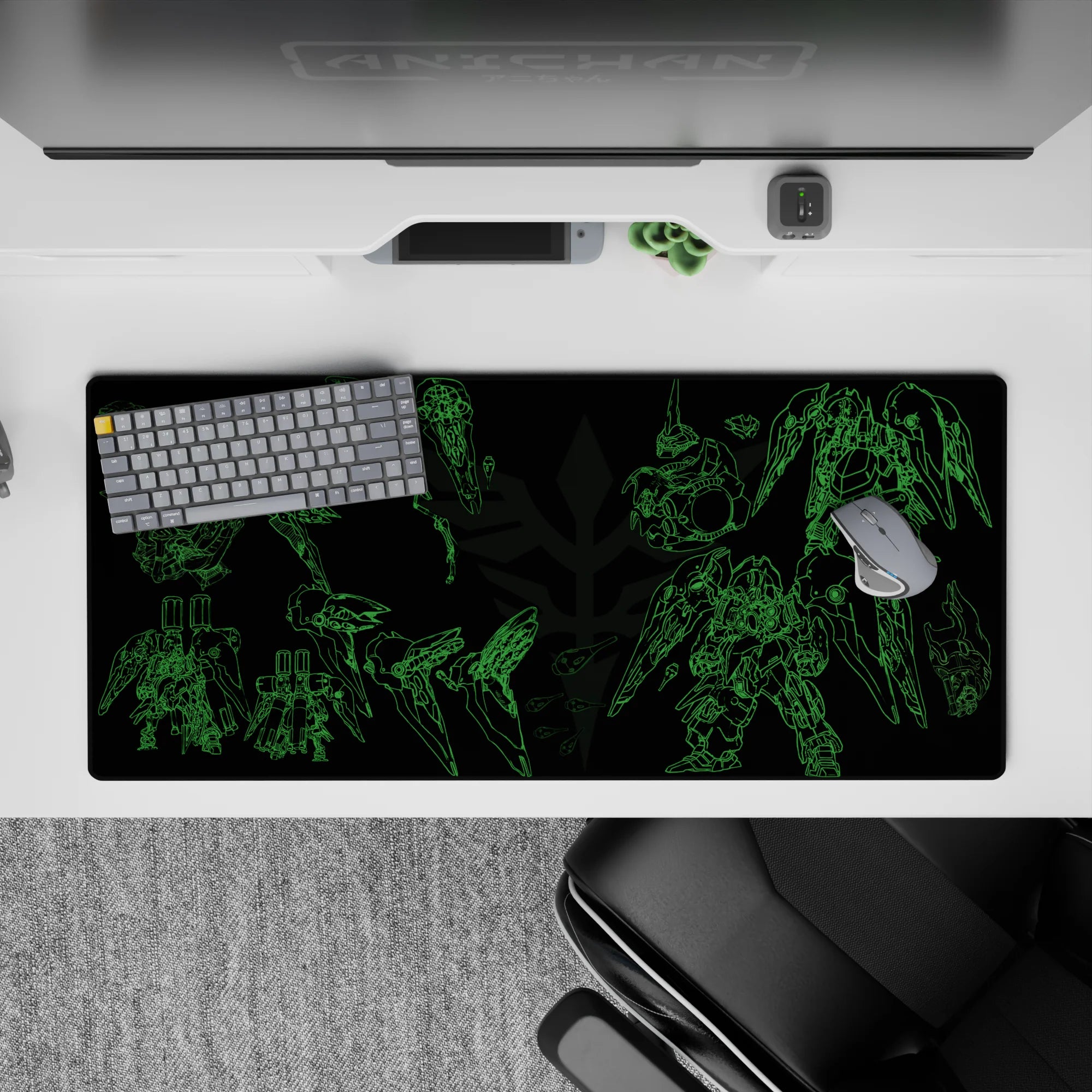 36x16 inches anime desk pad in electric green linework on deep black, sleek hangar-bay mood.