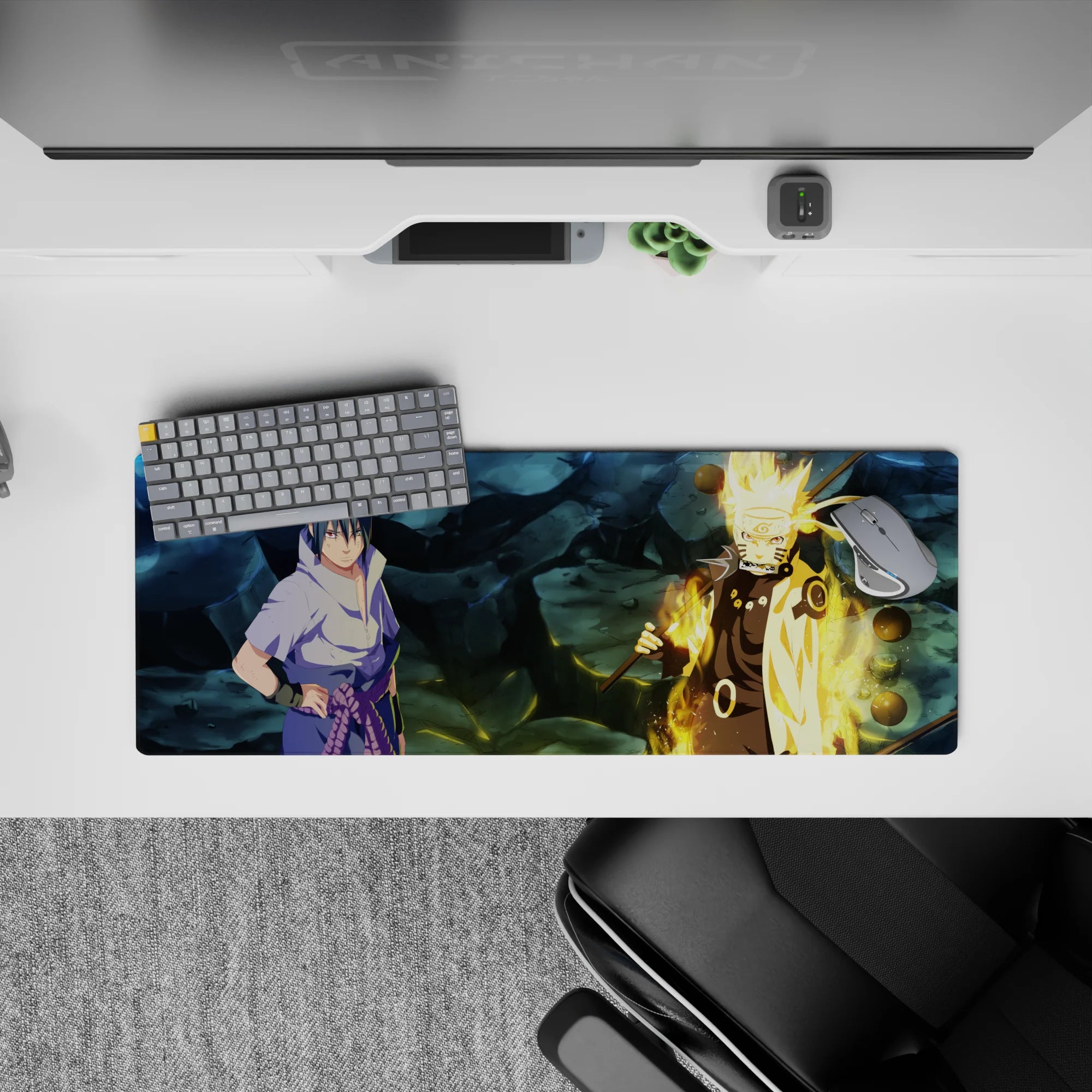 32x12 inches anime mouse pad in steel-blue shadows and Kurama gold glow, warm light on moody backdrop.