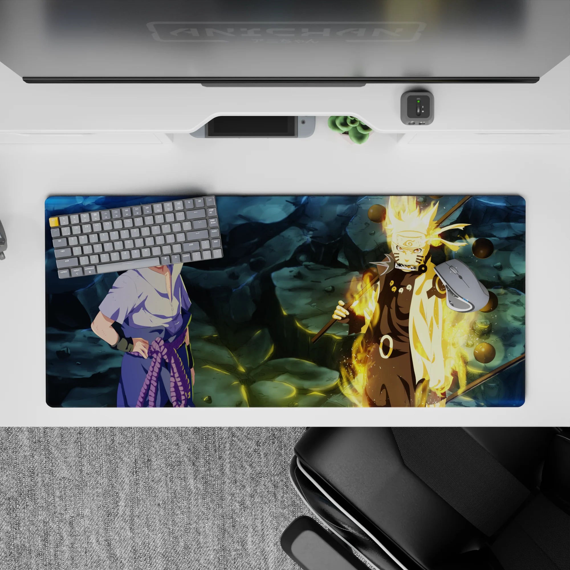 36x16 inches anime desk pad in steel-blue shadows and Kurama gold glow, gritty rocky texture.