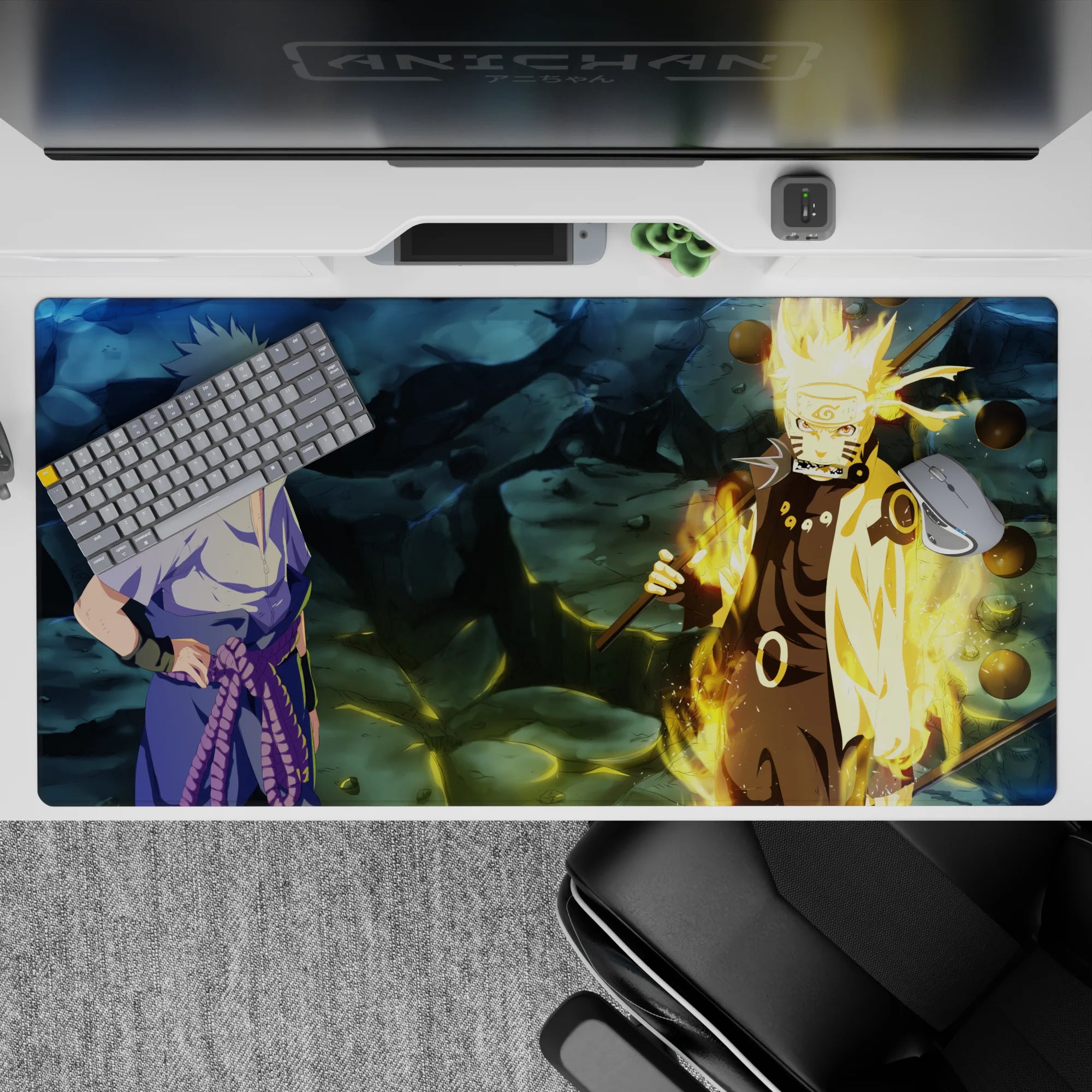 40x20 inches anime desk pad in steel-blue shadows with Kurama gold glow, warm light on dark backdrop.