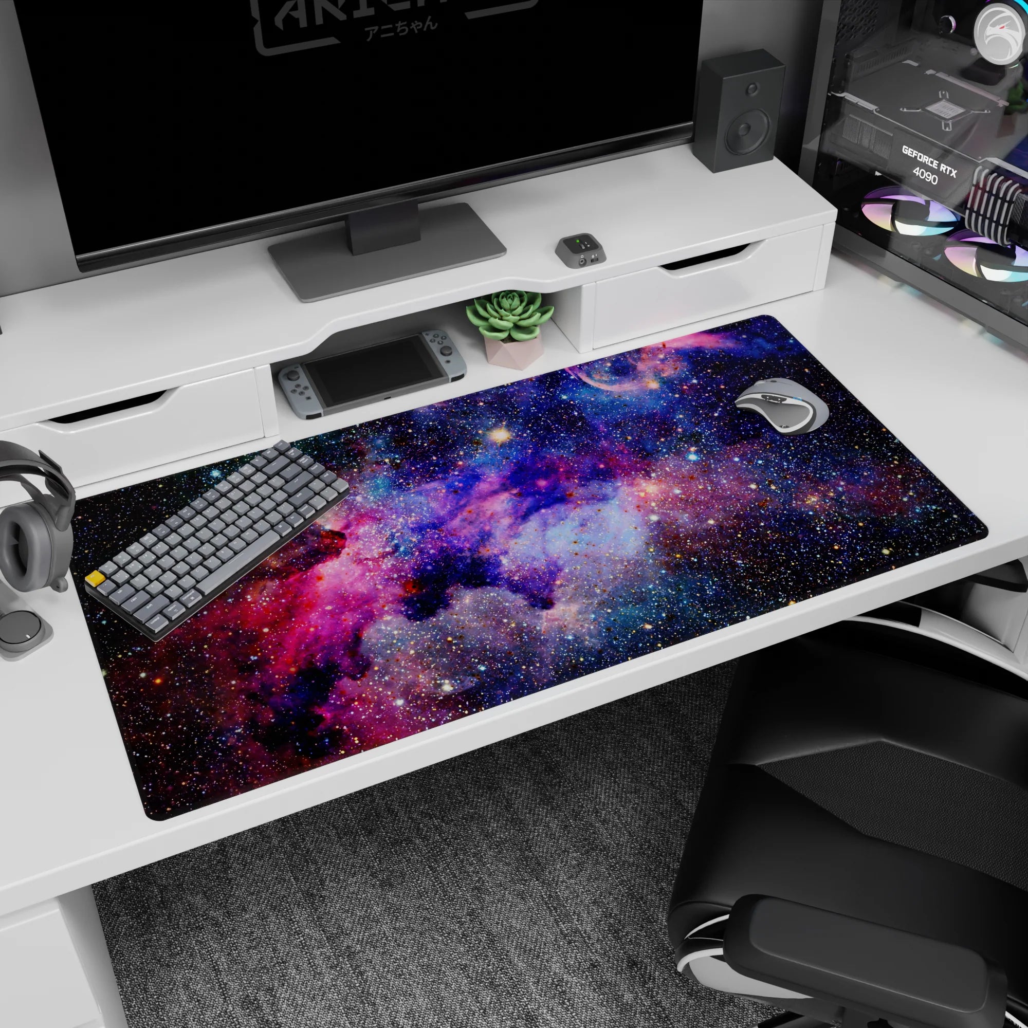 Starry nebula cloud scene desk pad 40x20 inches with tiny stars across a cosmic night sky backdrop.
