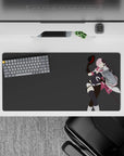 32x16 inches anime desk mouse pad in bold pink and black tones, flirty wink vibe on a clean gray background.