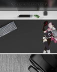 Flirty pink-and-black anime desk pad 40x20 inches, bold minimal lines on a flat gray backdrop.