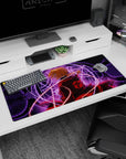 Edward Elric turns over his shoulder in a dramatic alchemy scene on anime desk pad, 36x16 inches.