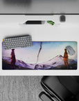 Lavender-to-icy blue sky over snowy peaks, ash flecks, calm storm vibe mouse pad 32x12 inches.