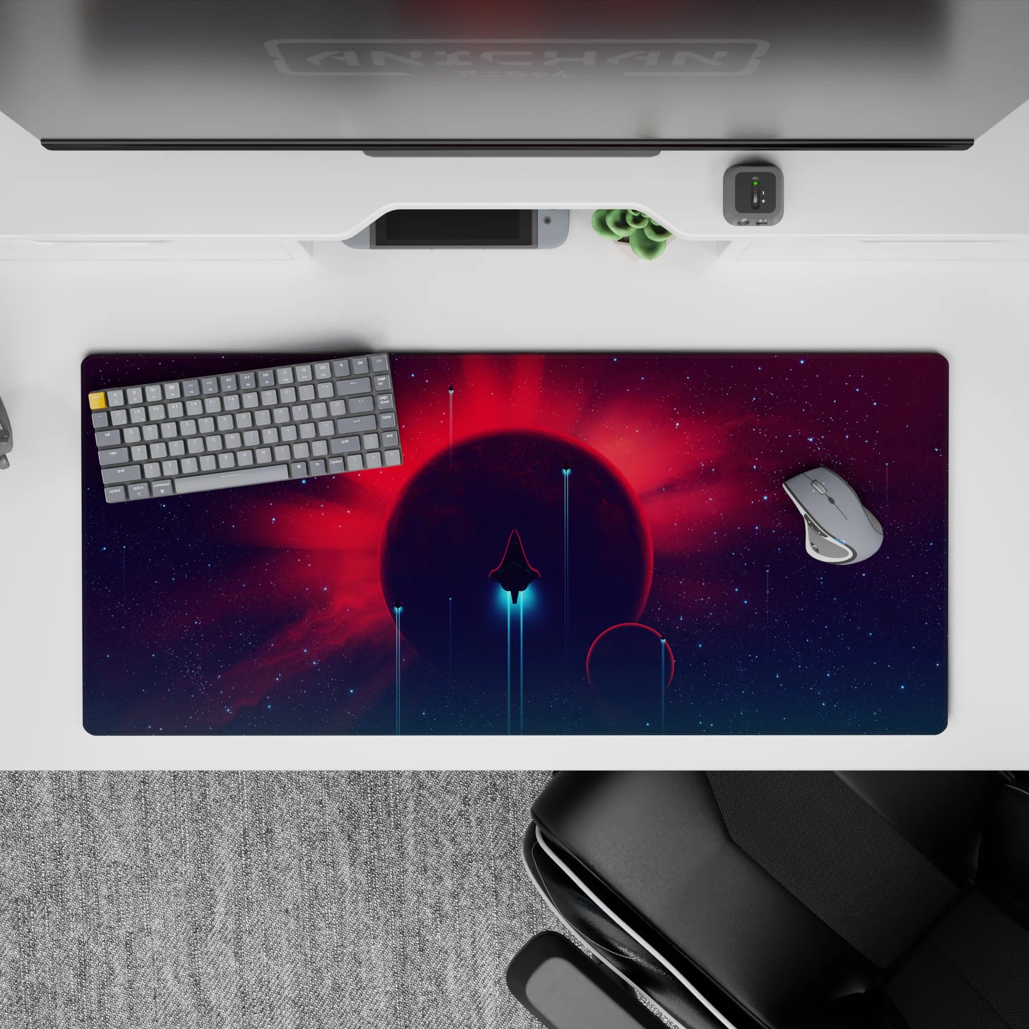 Calming sci-fi desk pad 36x16 inches in deep purple, hot red rays, and teal haze for a clean look.