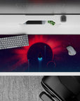 Calming sci-fi desk pad 36x16 inches in deep purple, hot red rays, and teal haze for a clean look.