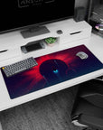Giant glowing planet sunrise scene desk pad 36x16 inches under a starry purple sky with teal light beams.