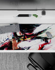 Red-and-black anime desk pad 36x16 inches with bold metallic accents and fast, loud street-battle vibe.