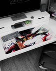 Anime girl desk pad 36x16 inches showing a red-streaked black-haired heroine lunging mid-sprint.