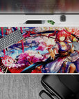 Dreamy 40x20 inches anime desk pad in lantern red, sakura pink, and river blue with drifting petals.