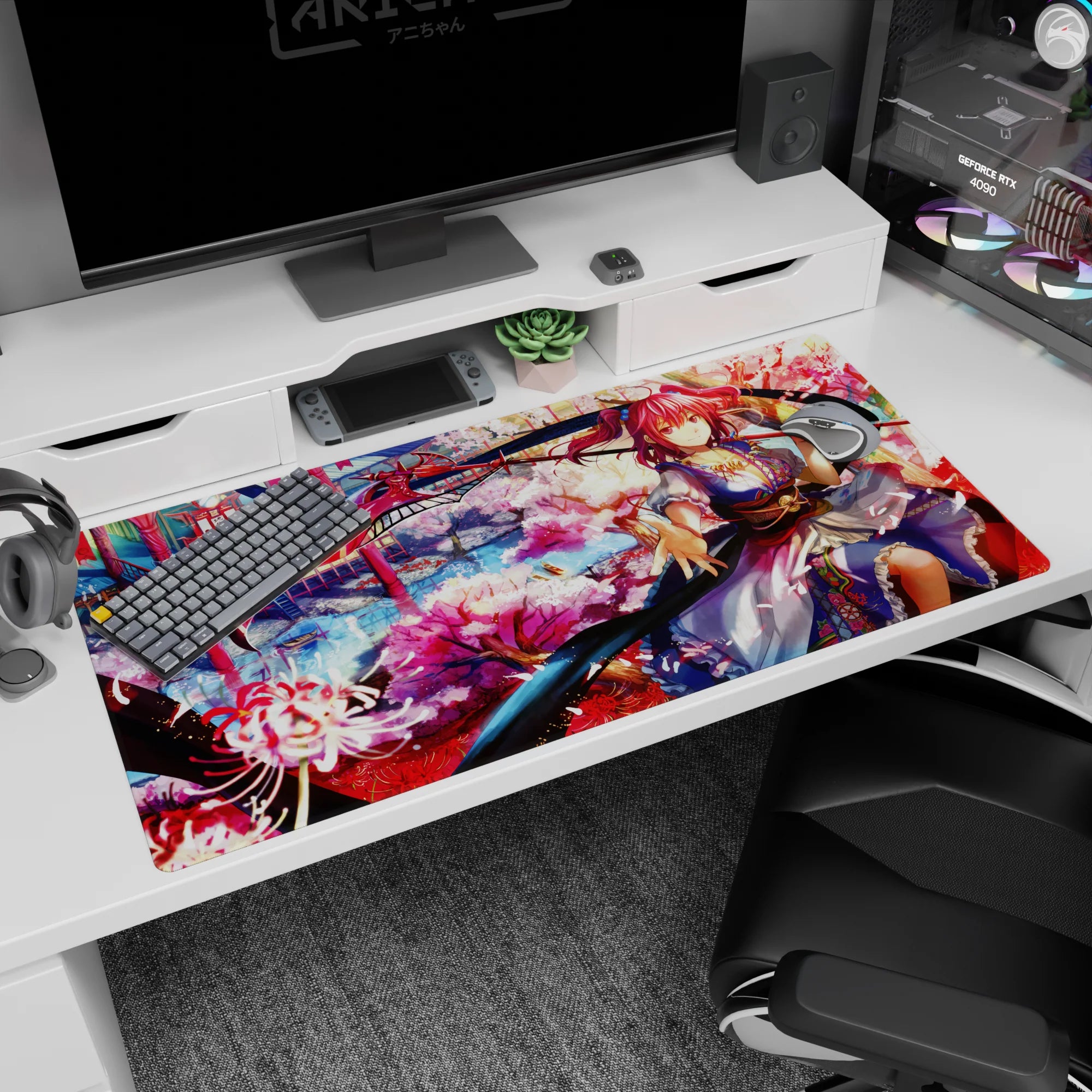 Pink-haired shrine warrior with scythe ribbon under cherry blossoms on 40x20 inches anime girl desk pad.