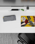 Dark-playful anime mouse pad 14x10 inches in gray, green, red plaid, and mustard tones with swirling scythe energy.